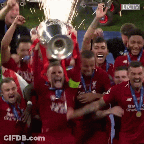 Soccer Players Holding Trophy Celebrating GIF