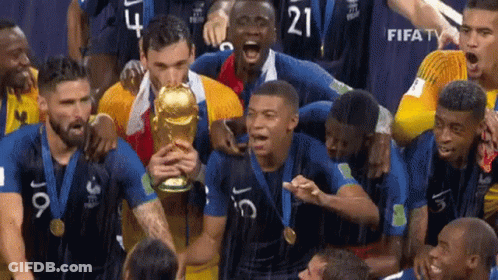 Soccer Players Holding Trophy Number 21 GIF