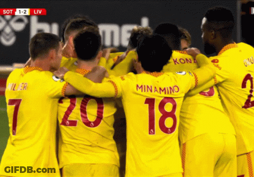 Soccer Players Huddle With Number 18 GIF