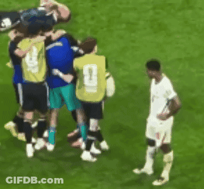 Soccer Players Huddled With Number 1 Jersey GIF