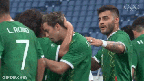 Soccer Players Huddled With Number 7 GIF