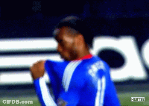 Soccer Players Hugging Drogba GIF
