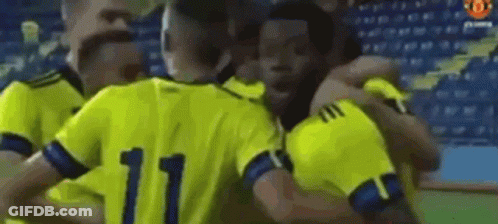 Soccer Players Hugging In Huddle GIF