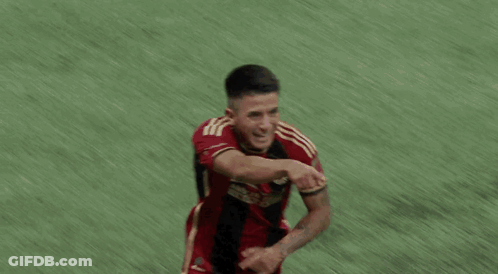 Soccer Players Hugging Number 10 Jersey GIF