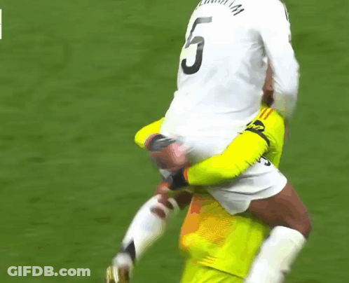 Soccer Players Hugging Number 6 Jersey GIF