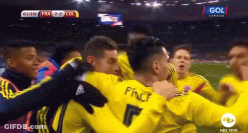 Soccer Players Hugging Number 7 Shirt GIF