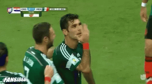 Soccer Players Hugging On Field H. Moreno GIF