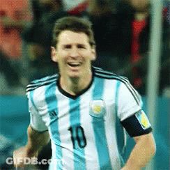 Soccer Players Hugging On Field GIF