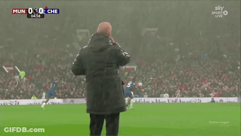 Soccer Players Hugging On Field GIF
