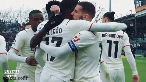 Soccer Players Hugging, One In Number 11 GIF