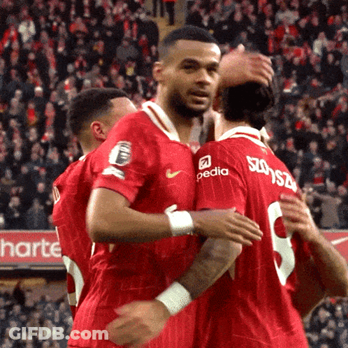 Soccer Players Hugging, One Wearing Pedia Shirt GIF