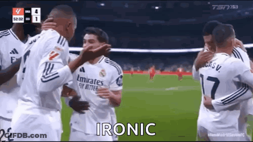Soccer Players Hugging Saying Ironic GIF