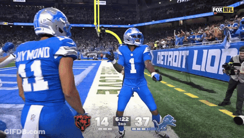 Soccer Players Hugging Saying Ironic GIF