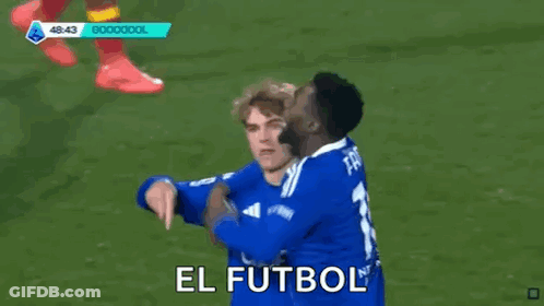 Soccer Players Hugging With El Futbol GIF
