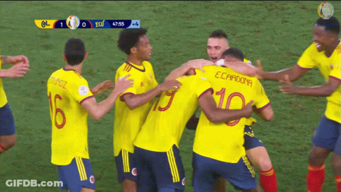Soccer Players Hugging With Number 10 On Back GIF