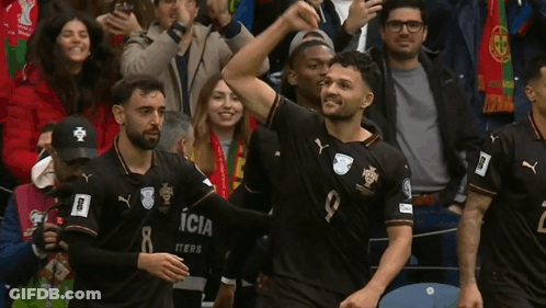 Soccer Players In Black Jerseys Number 8 GIF