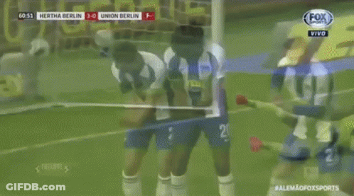 Soccer Players In Blue And White Striped Uniforms Number 21 GIF