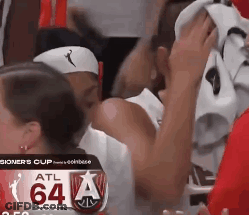 Soccer Players In Emirates Jerseys Celebrate On Field GIF