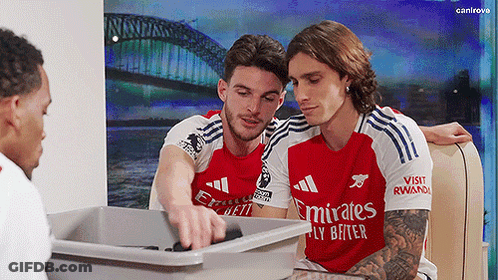 Soccer Players In Emirates Jerseys Looking At Trash GIF