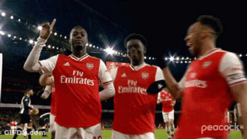 Soccer Players In Fly Emirates Jerseys On Field GIF