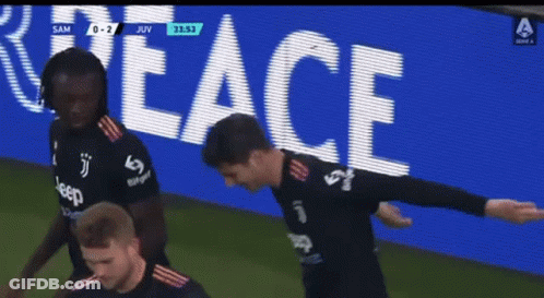 Soccer Players In Front Of Peace Sign GIF