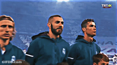 Soccer Players In Front Of Screen GIF