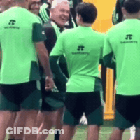 Soccer Players In Green Shirts With Letter J GIF
