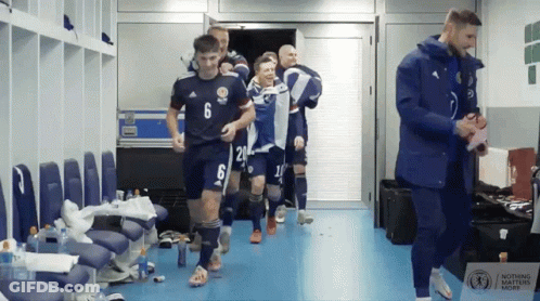 Soccer Players In Locker Room GIF