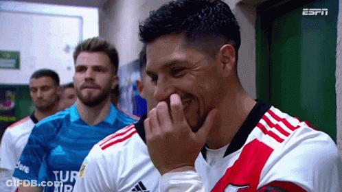 Soccer Players In Locker Room One Holding Nose GIF