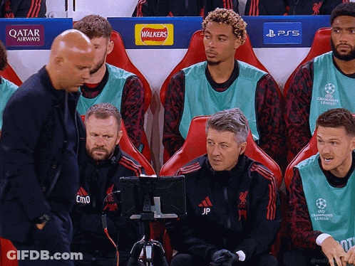 Soccer Players In Locker Room Sponsored By Qatar Airways And Walker's GIF