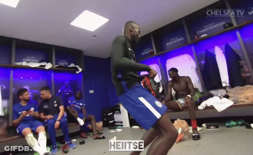 Soccer Players In Locker Room With Number 1 GIF