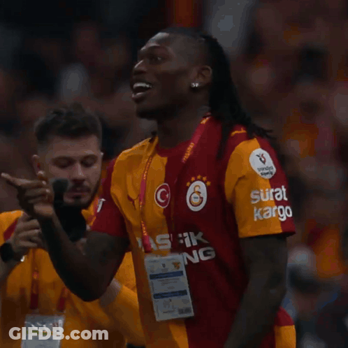 Soccer Players In Number 99 Jerseys GIF