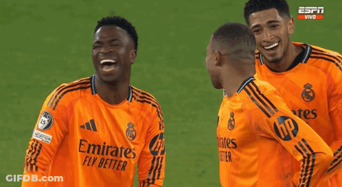 Soccer Players In Orange Jerseys Emirates Fly Better GIF