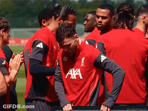 Soccer Players In Red Shirts With AXA GIF