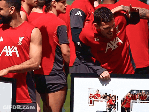 Soccer Players In Red Shirts With AXA GIF