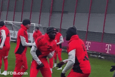 Soccer Players In Red Shirts With T GIF
