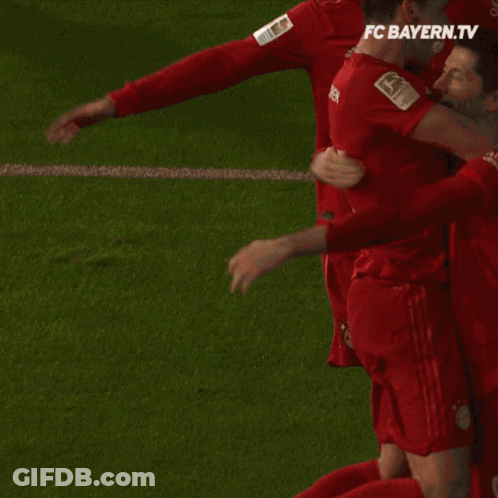 Soccer Players In Red T-Mobile Jerseys Celebrating GIF