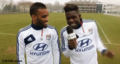 Soccer Players In White Hyundai Jerseys Talking GIF