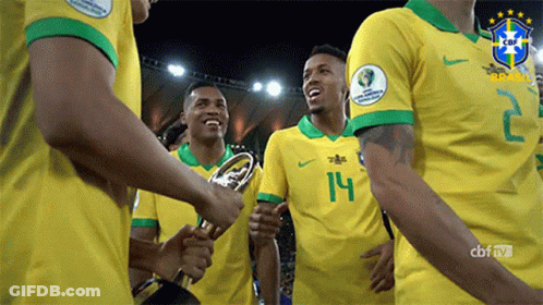Soccer Players In Yellow Jerseys Number 14 GIF