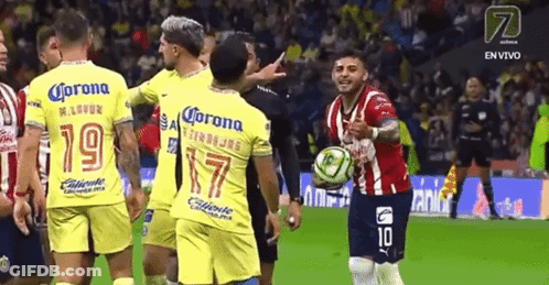 Soccer Players In Yellow Jerseys With Corona GIF