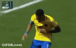 Soccer Players In Yellow Shirts And Blue Shorts GIF