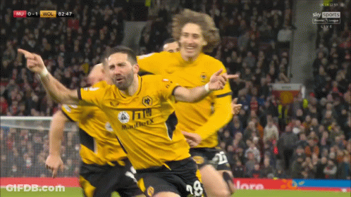 Soccer Players In Yellow Wolves Jerseys GIF