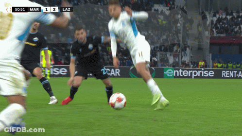 Soccer Players On A Field With A Banner For Enterprise GIF