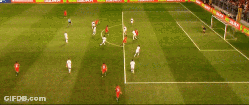 Soccer Players On A Field With A Banner That Says Compre Produto Oficial GIF