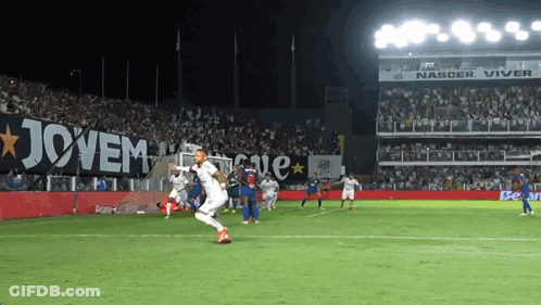 Soccer Players On A Field With A Banner That Says Jovem On It GIF