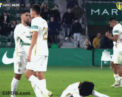 Soccer Players On A Field With A Banner That Says Map GIF