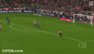 Soccer Players On A Field With A Banner That Says Paulaner On It GIF