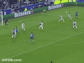 Soccer Players On A Field With A Banner That Says Unicredit In The Background GIF