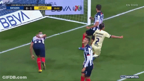Soccer Players On A Field With A Bbva Banner In The Background GIF