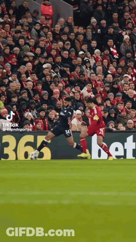 Soccer Players On A Field With A Sign That Says 365 GIF